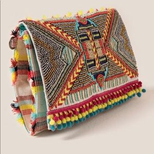 Francesca’s Beaded Pom Clutch